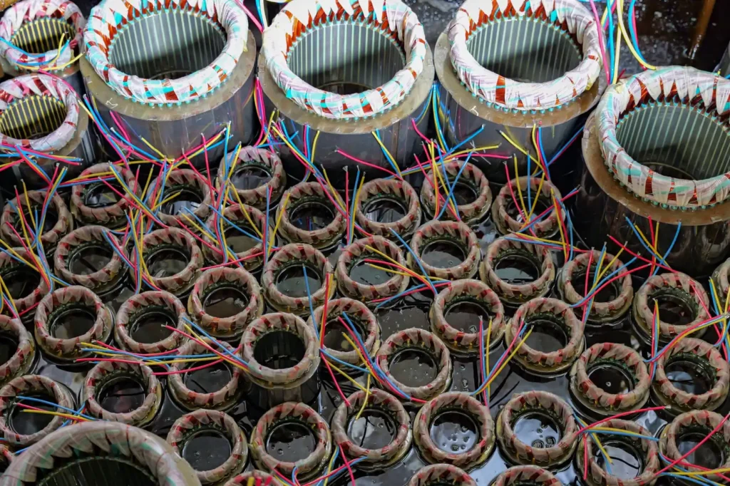 Finished three-phase motor stator winding coils with phase insulation