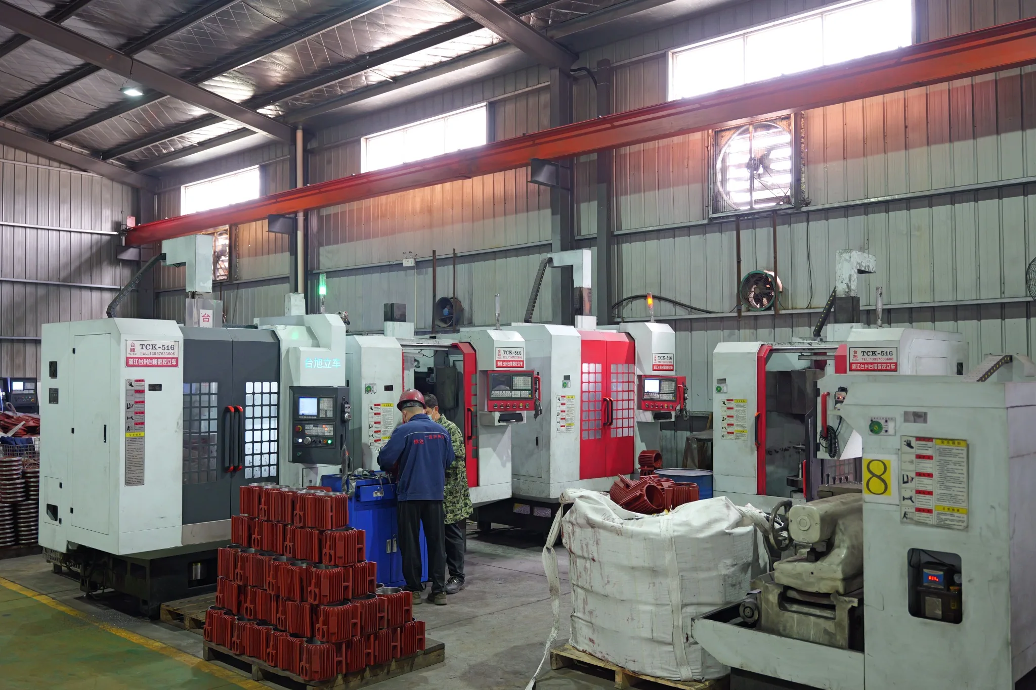 Motor housing precision machining workshop with CNC equipment