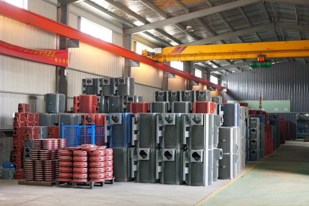 Finished motor housings and casing components in workshop
