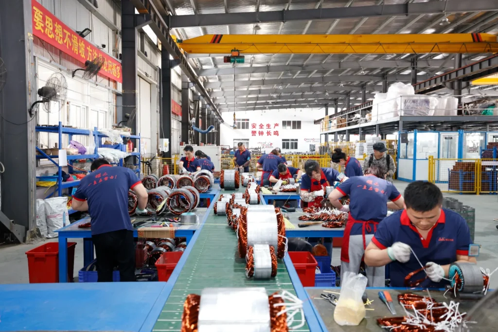 Motor stator inserting production line with workers