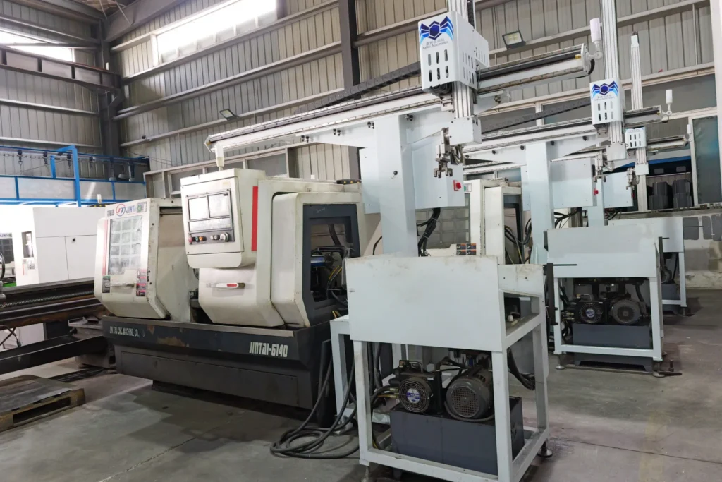 Precision machining line for motor shafts and rotor parts