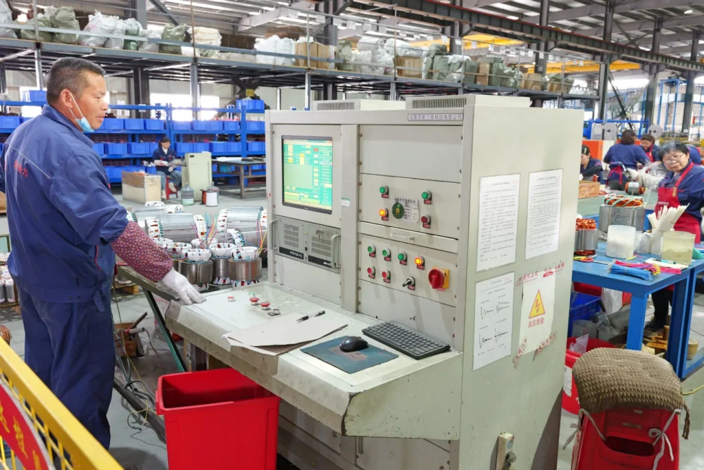Stator winding high-voltage and insulation testing station at the Yaoda Motor factory